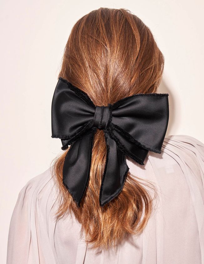 A low ponytail for an evening.