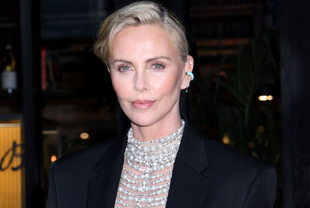 Charlize Theron looks stunning in an ultra-sheer pearl dress - OiCanadian